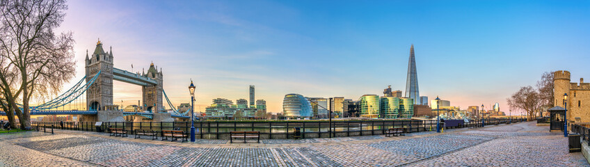 Tower of London wharf and Tower Bridge at sunrise 