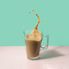 Coffee drink on pastel light pink and mint background. Creative ' take a break ' concept. Minimalistic beverage composition. Summer relax time idea.
