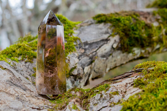 A close up image of a smoky quartz crystal tower used for energy healing.  