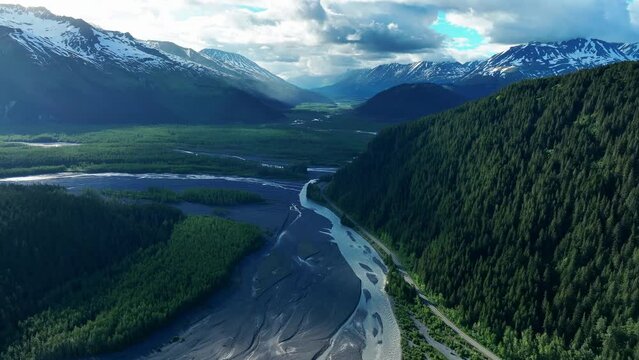 Dramatic Aerial View Of Resurrection River With Dense Forest And Glacier Near Seward, Alaska.