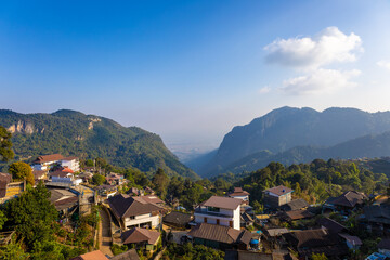Fototapeta premium Panorama view, blue sky and white clouds, mountain landscape and green trees