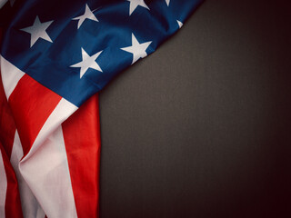 Part of the American flag is on a black background