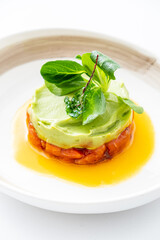 salmon tartare on the white plate