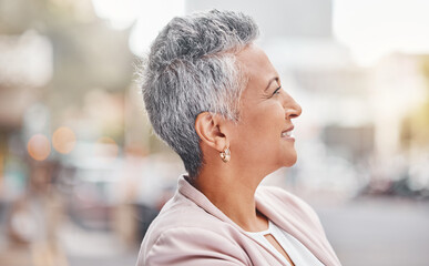 Senior woman, city and business person profile with blurred background thinking of finance work....