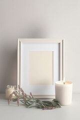Blank square photo frames, candles with Generative AI