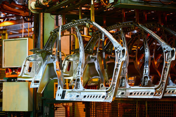 Details of car carcass hang on assembling conveyor