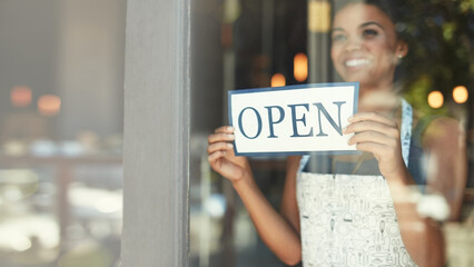 Small business, open sign and woman in cafe window for welcome, advertising and coffee shop...