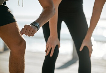 Running couple, time and smartwatch with fitness and check heart rate with cardio and outdoor...