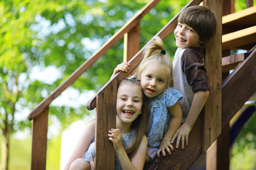 Obraz premium Children walk in the summer in nature. Child on a sunny spring morning in the park. Traveling with children.