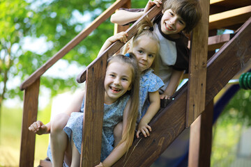 Obraz premium Children walk in the summer in nature. Child on a sunny spring morning in the park. Traveling with children.