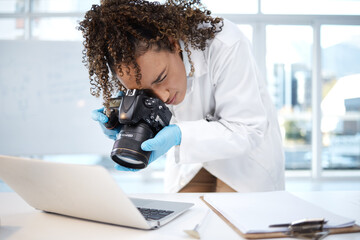 Medical investigation, camera and black woman with laptop in laboratory for forensic research with...