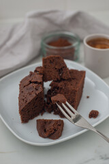 Fototapeta na wymiar brownie cake. Dark chocolate brownie on a table
