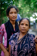 South asian hindu religious village mother with her young daughter 