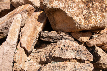 Wall of stacked rocks forming a structure full of texture