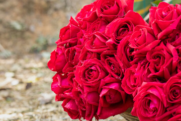 Rose bouquet on a basket close up with copy space