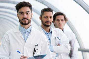 young all men healthcare team posing