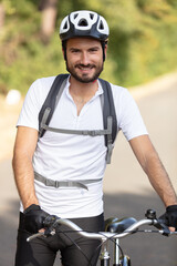 happy smiling bearded cyclist posing