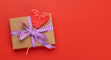 Gift box and candy heart lollipop