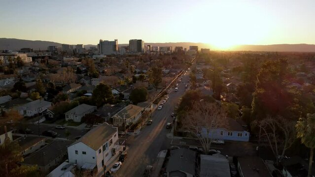 san jose california aerial push in to skyline at sunset