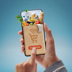 Obraz na płótnie Canvas Online grocery shopping app on smartphone