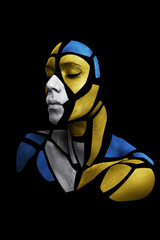 Portrait of a human with creative art makeup posing in the studio. Shape of silver gray, blue and yellow polygons on beautiful face, neck and shoulders. Parts of face isolated on black background.