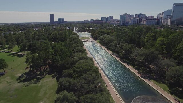 Aerial - Hermann Park reflection pool on a sunny day - Houston, TX