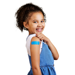 Fototapeta A afro american girl kid showing a plaster on her arm isolated on a png background. Cute hispanic child lifting her sleeve to show injection site for covid or corona jab and vaccination. obraz