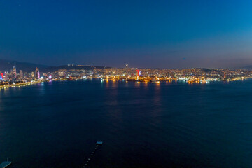city skyline at night in izmir