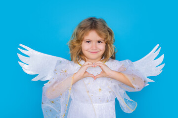 Angel child. Isolated studio shot. Cute kid with angel wings. Cupid, valentines day concept.