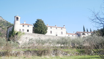 Fototapeta premium Monastery building in Montenegro. Monastery on the Main. Old monastery in the mountains. temple building