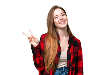 Young pretty woman over isolated chroma key background smiling and showing victory sign