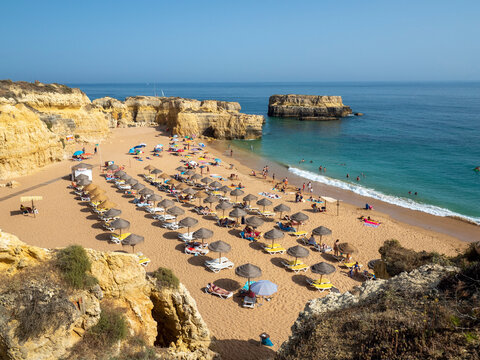 Parasols at Praia do Castelo on sunny day