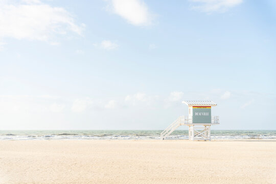 Lifeguard hut at beach on sunny day