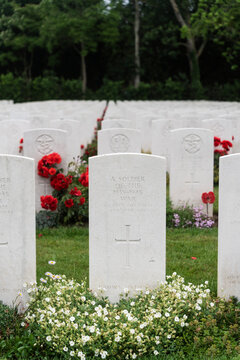 Gravestones with flowers on cemetery