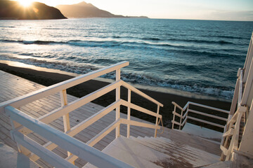 White wooden steps to the beach, Procida, Italy