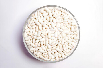 white bean on cup isolated top view on a white background