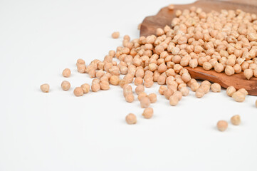 Organic chickpeas on a wooden stand. Side view