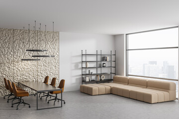 Fototapeta premium Stylish meeting interior with work table and chill corner near panoramic window