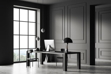 Grey ceo interior with desk and pc computer, panoramic window