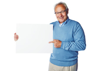 A confident cheerful senior standing and holding and pointing at a blank pla card or a banner as promoting or recommending at a copy space isolated on a png background.