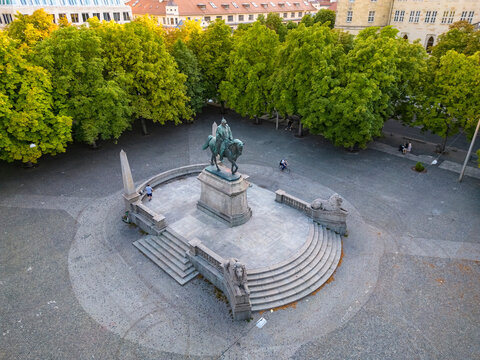King Karl's memorial statue in front of trees at Karlsplatz Square, Stuttgart, Germany
