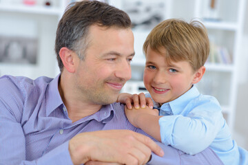 Fototapeta premium a portrait of a father and his son