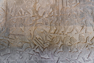 Excellent warriors with a spear's bas-relief or stone carving on the wall of Angkor Wat Temple, Siem Reap, Cambodia