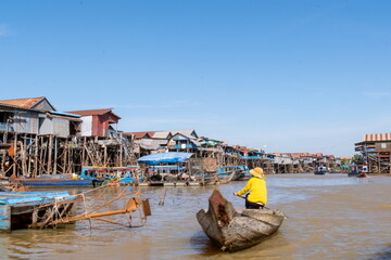 A wooden boats on the Tonle Sap lake - close to Siem Reap. Cambodia - 571162072