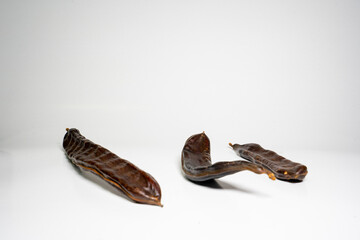 Photo of vegetarian cocoa with carob isolated on white background