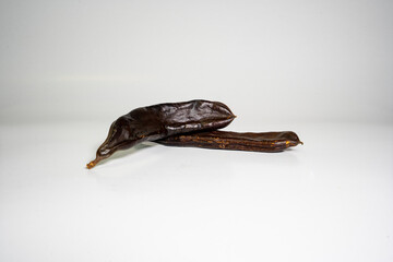 Obraz premium Photo of vegetarian cocoa with carob isolated on white background