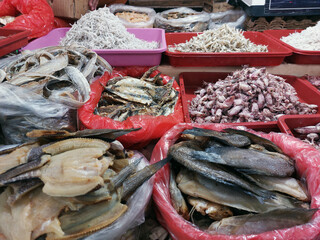 Dry salted cod fish or ikan asin for sale at market, is fish cured with dry salt and thus preserved for later eating