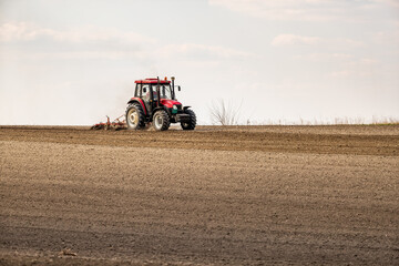 The dance of the tractor, cultivating the land in anticipation of new growth