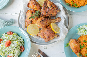 Baked chicken with tomato rice and salad for dinner or lunch