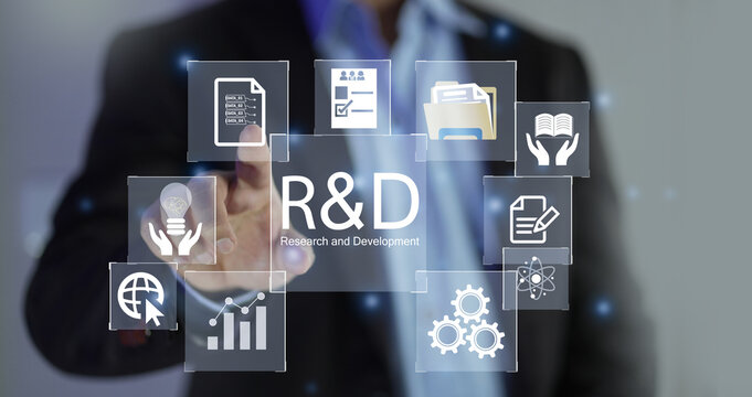 Businessman use a computer with the R and D icon for Research and Development on the laptop screen. R&D: Research and Development Business Science Technology Concept. Manage costs more efficiently.